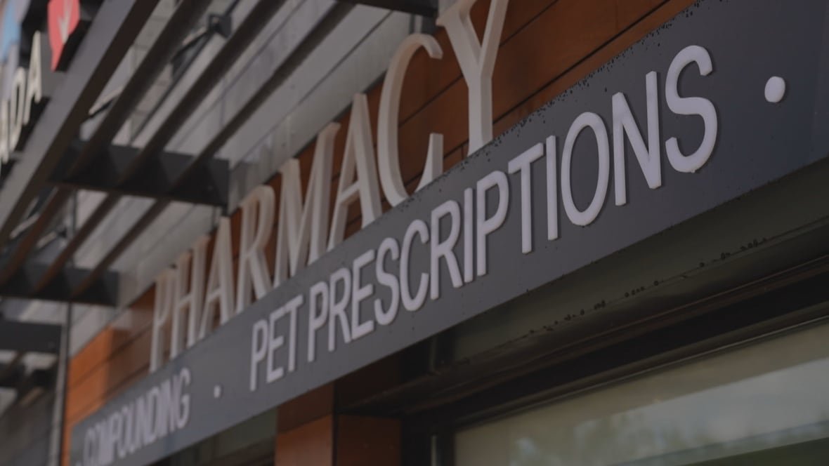 A sign that says Pet Prescriptions, underneath the word pharmacy in large letters