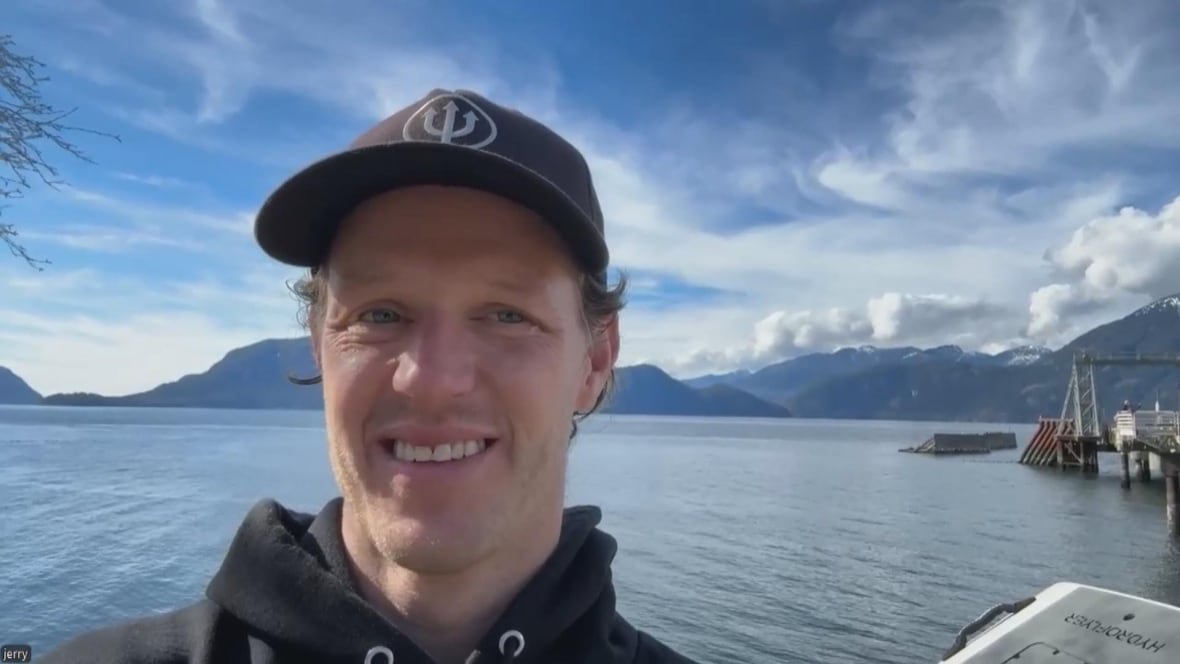 jerry-mcarthur A man smiles by the ocean.