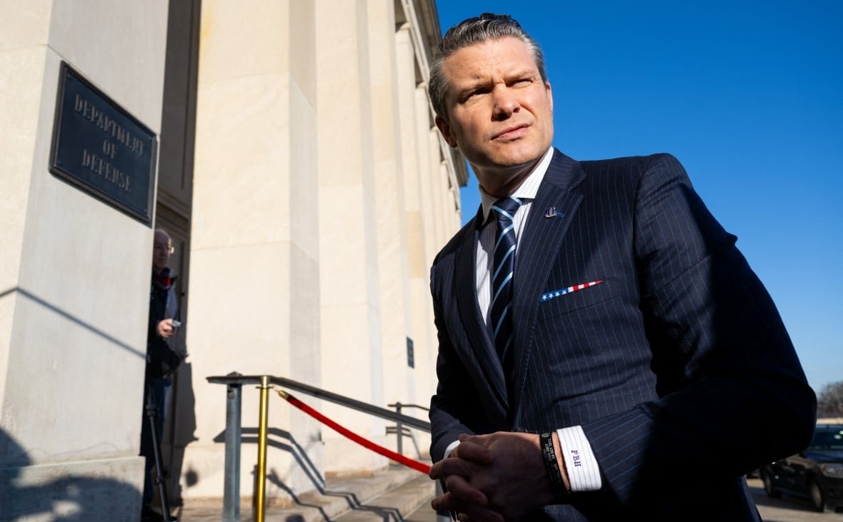 U.S. Secretary of Defence Pete Hegseth standing outside the Pentagon.