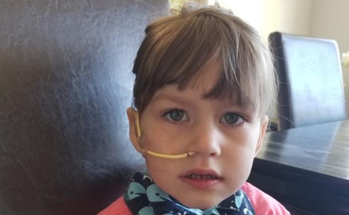 charleigh-pollock-1 A young girl with blonde hair and a medical tube in her nose