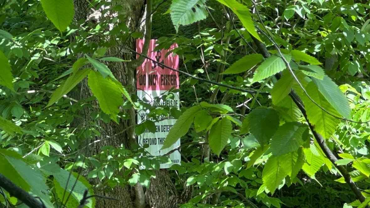 norfolk-county-gas-well Signs visible from Norfolk County resident Paula Jongerden's property warn people to stay away from a leaking gas well. Residents say they can't fully enjoy their homes because of the constant smell and other impacts of the well.