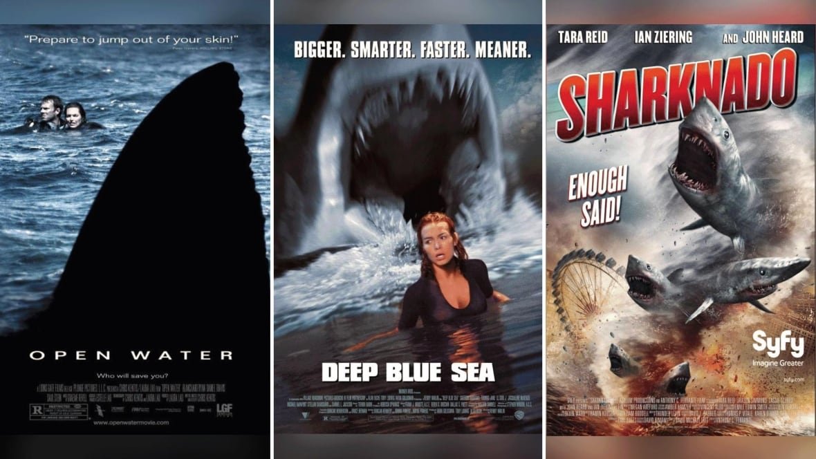open-water-deep-blue-sea-sharknado-posters Three movie posters, from left to right; a poster showing a large shark fin in the water with a man and woman swimming in the background; a poster with a woman standing in water with a large shark mouth behind her; a poster with tornado full of sharks.