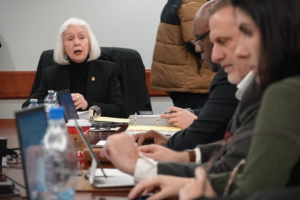jo-anne-gignac City councillor Jo-Anne Gingnac will now serve as the chair of Windsor's police services board. She sits in a boardroom with other members around her.