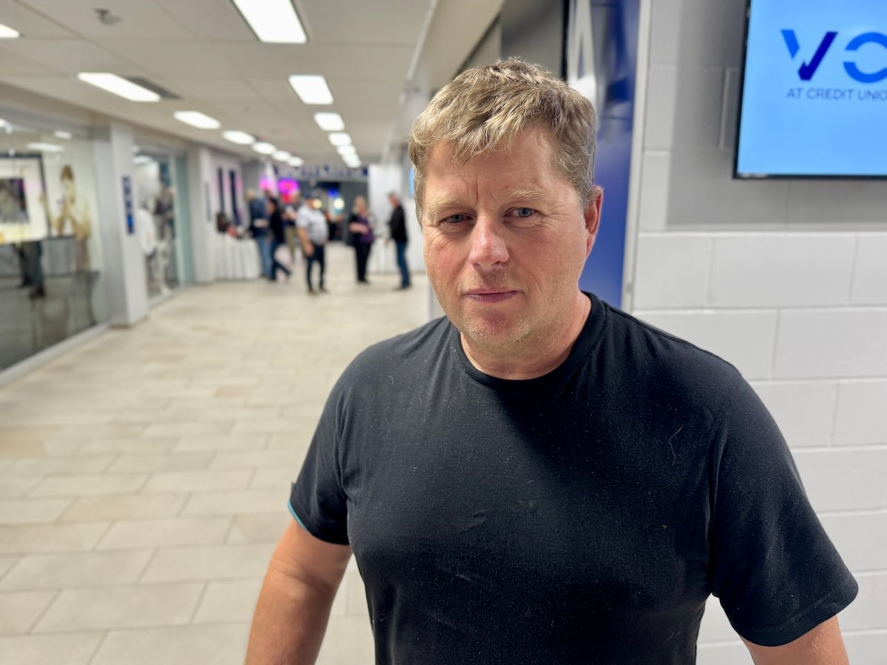 default-558 A man in a black t-shirt