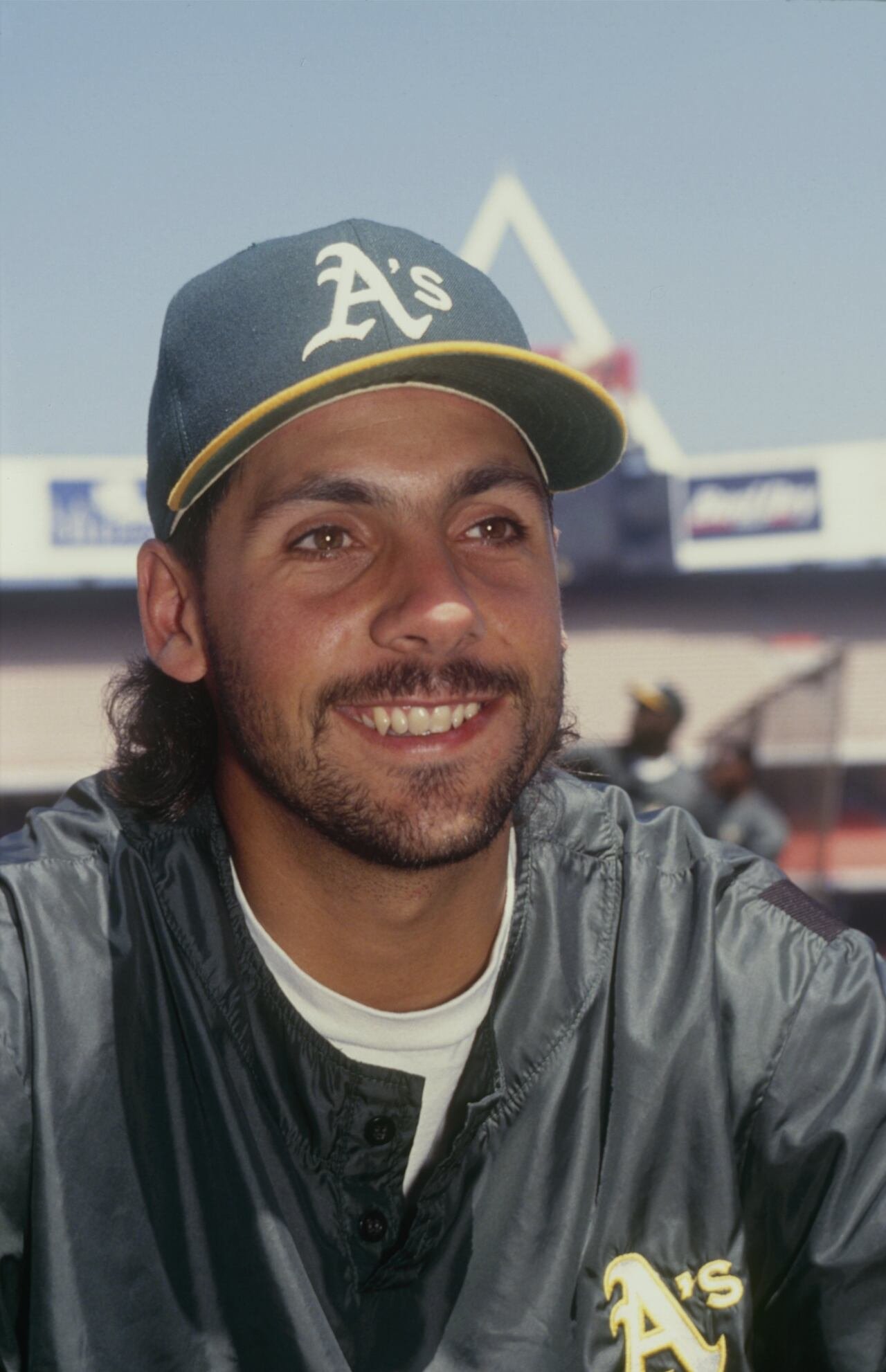 default-337 A smiling baseball player.