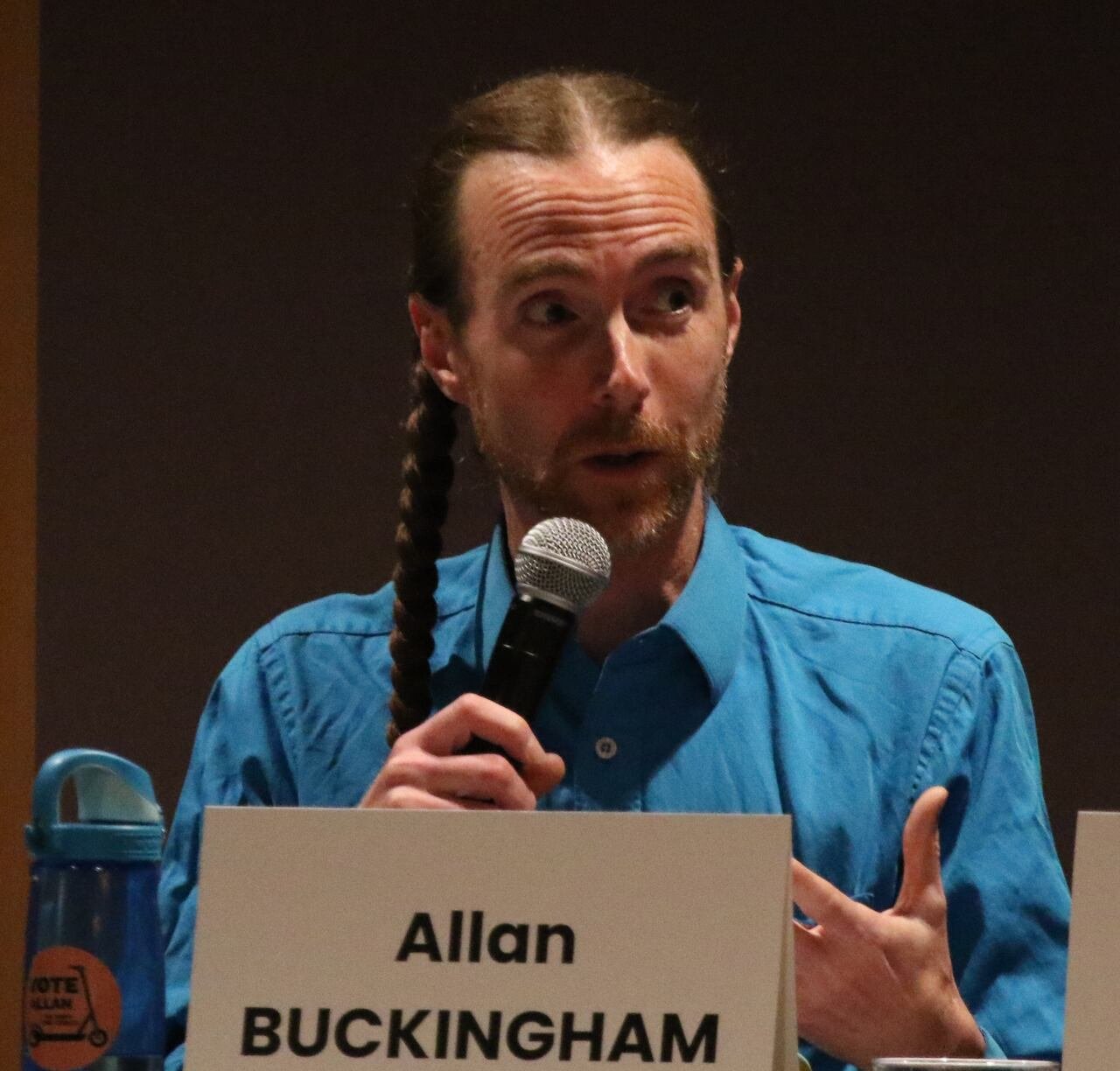 A council candidate speaking to an audience.