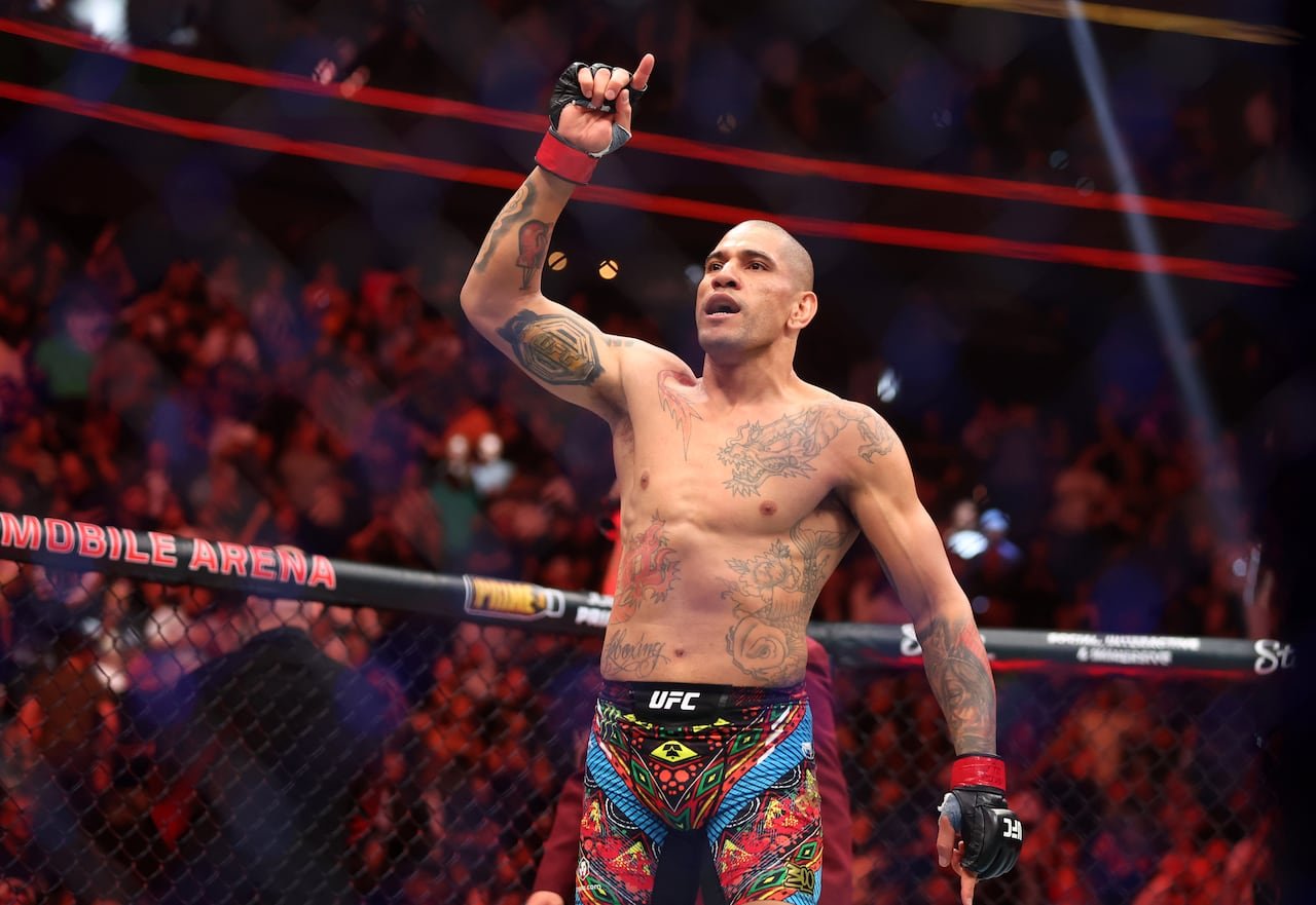 default-297 A mixed martial artist celebrates after winning a fight.